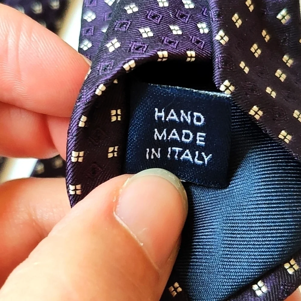 Purple and white patterned Italian silk tie